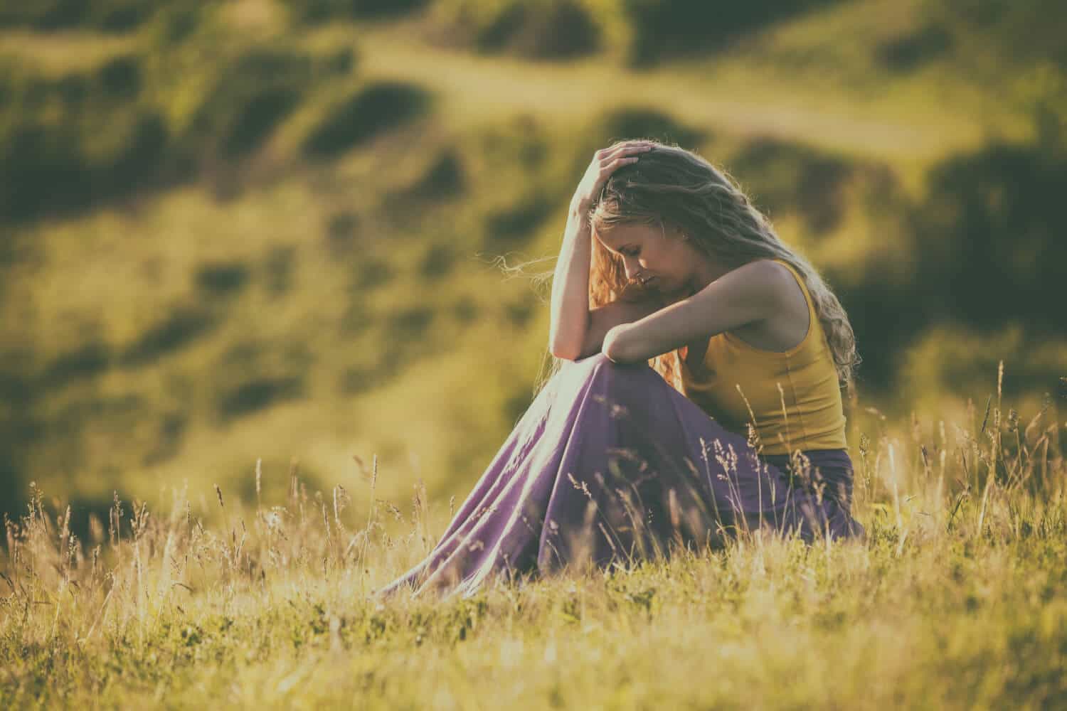 Woman depressed in the summer