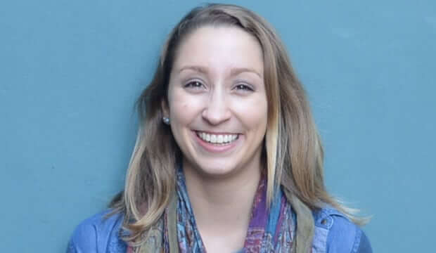 lady smiling with sky blue background